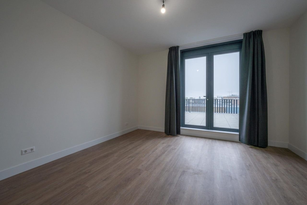 Apartment with 33m² roof terrace - Image 18