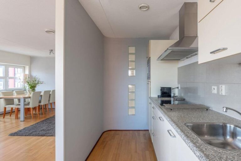 18e verdieping in de Stadsdriehoek met Maasuitzicht - Afbeelding 6