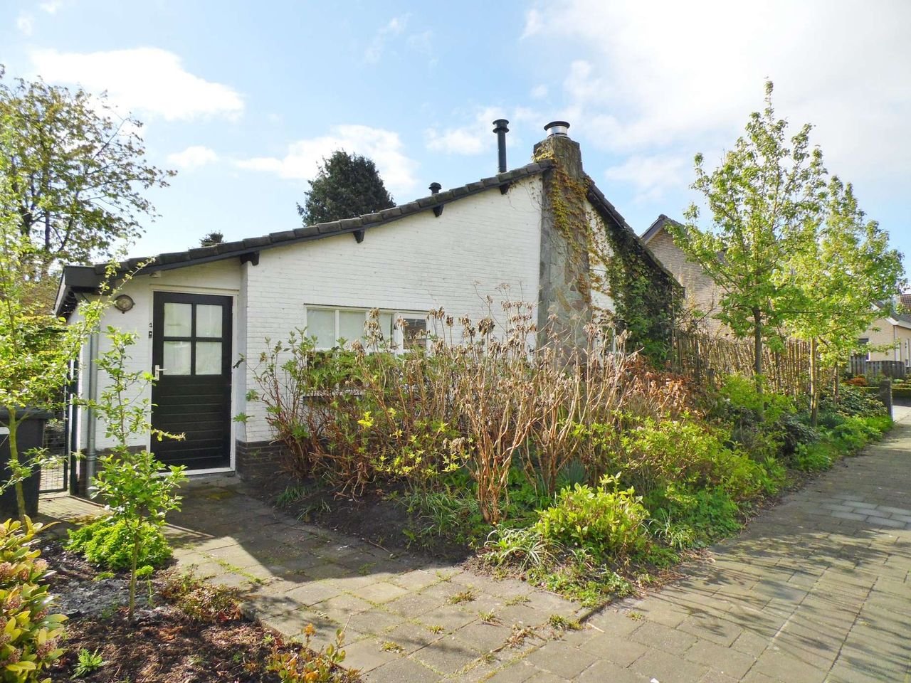 Vrijstaande bungalow met tuin in Chaam - Afbeelding 1