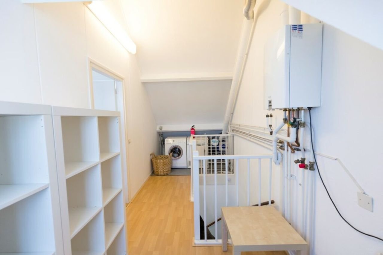 Hoekwoning met zonnige tuin in Middenhoven - Afbeelding 16