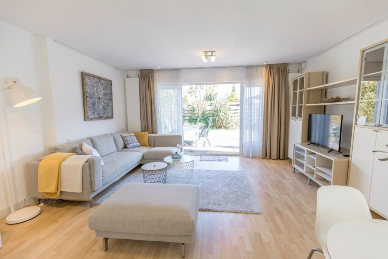 Hoekwoning met zonnige tuin in Middenhoven - Afbeelding 3