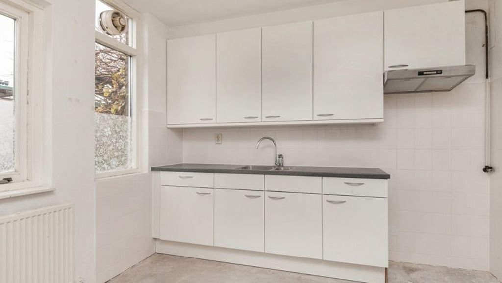 Tussenwoning met tuin en label A - Afbeelding 2