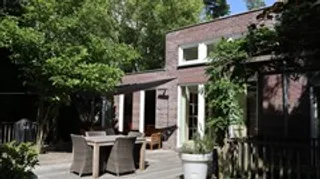 Vrijstaand huis met grote tuin