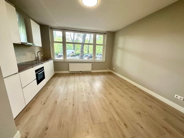 Benedenwoning met tuin in Amsterdam - Afbeelding 1