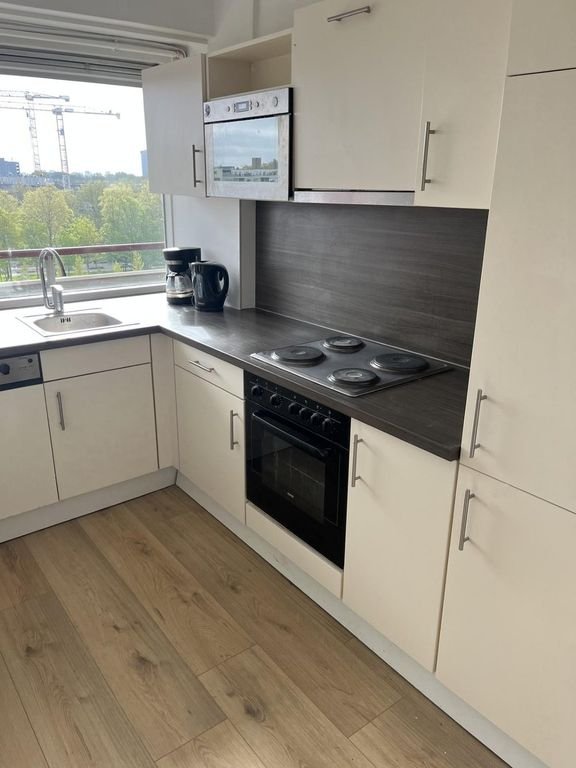 Licht 4-kamerappartement met balkon - Afbeelding 9