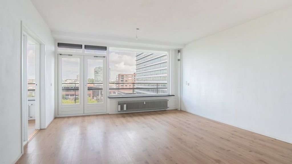 Licht 2-kamerappartement met lift - Afbeelding 2