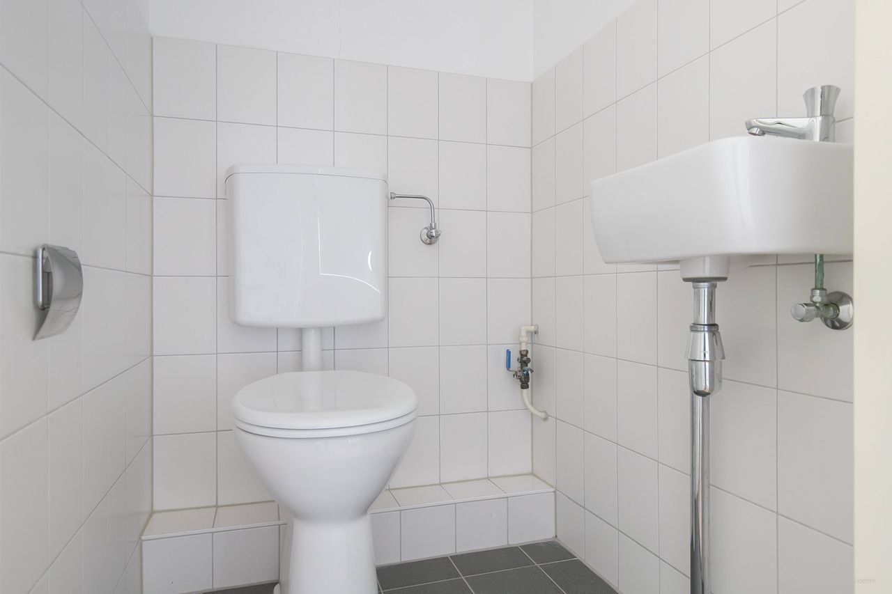 Licht 2-kamerappartement met lift - Afbeelding 15