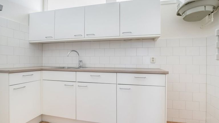 Licht 2-kamerappartement met lift - Afbeelding 4