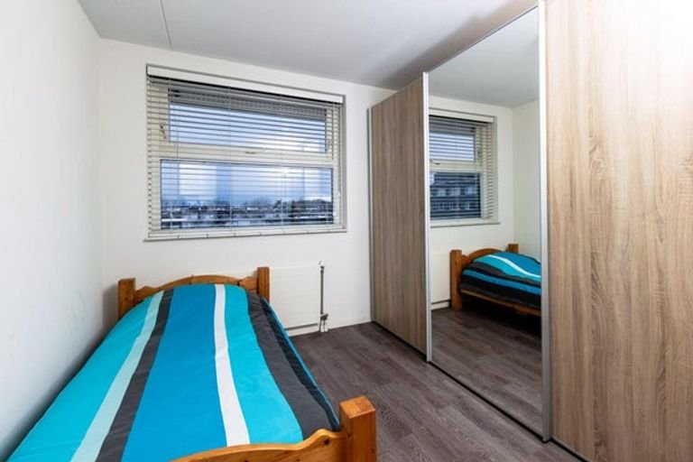 Topfloor appartement met zonnig balkon - Afbeelding 9