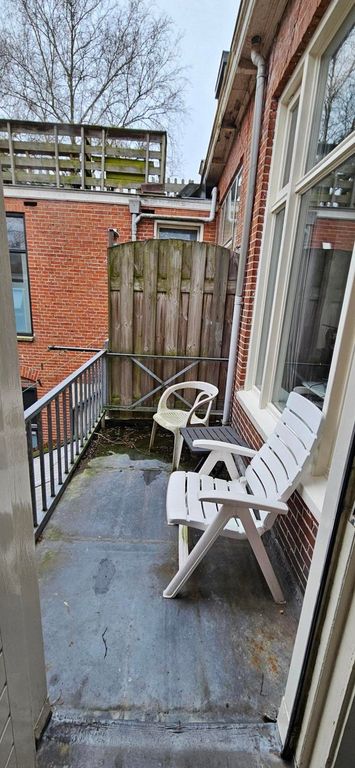Lichte kamer (15 m²) in de Korrewegwijk - Afbeelding 12