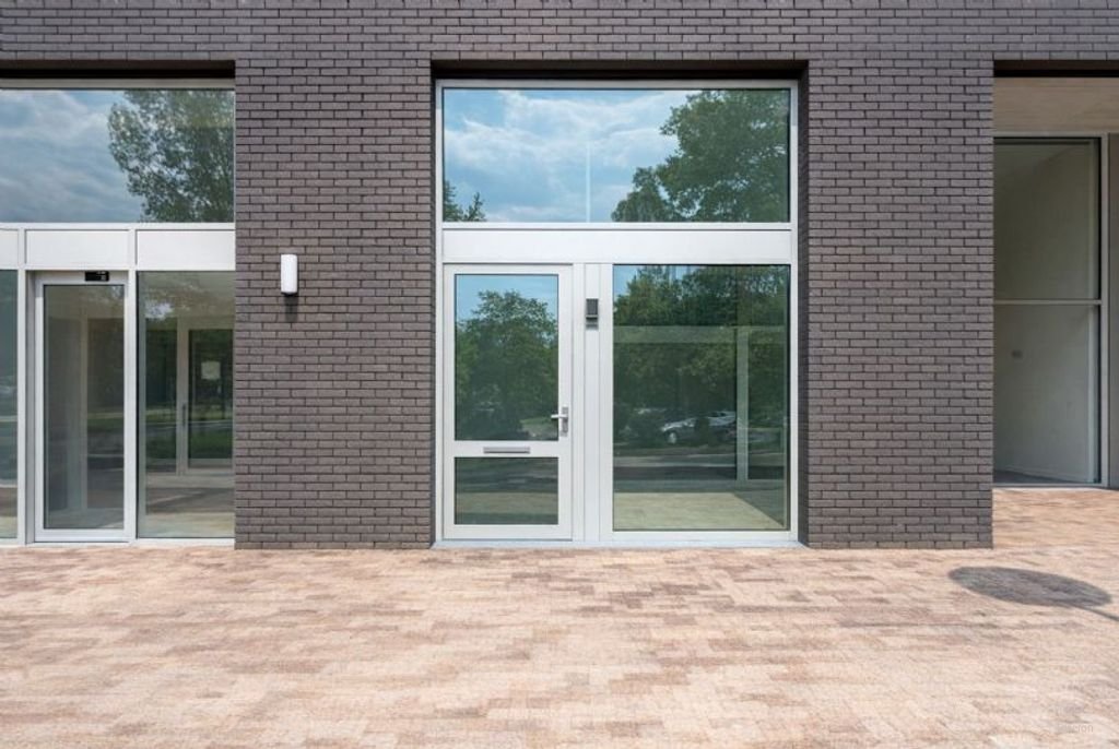 121 m² maisonnette met terras en parking - Afbeelding 1
