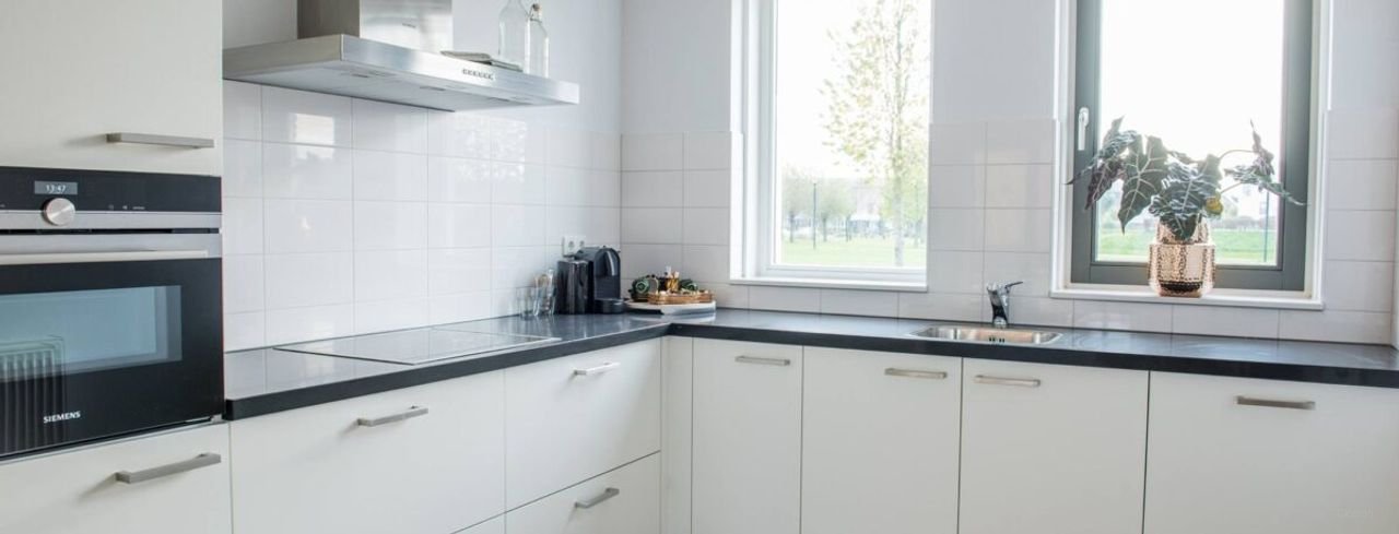 Eengezinswoning met 4 slaapkamers en tuin - Afbeelding 2