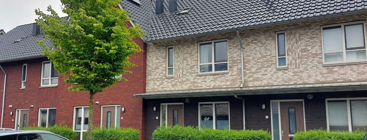 Eengezinswoning met 4 slaapkamers en tuin - Afbeelding 1