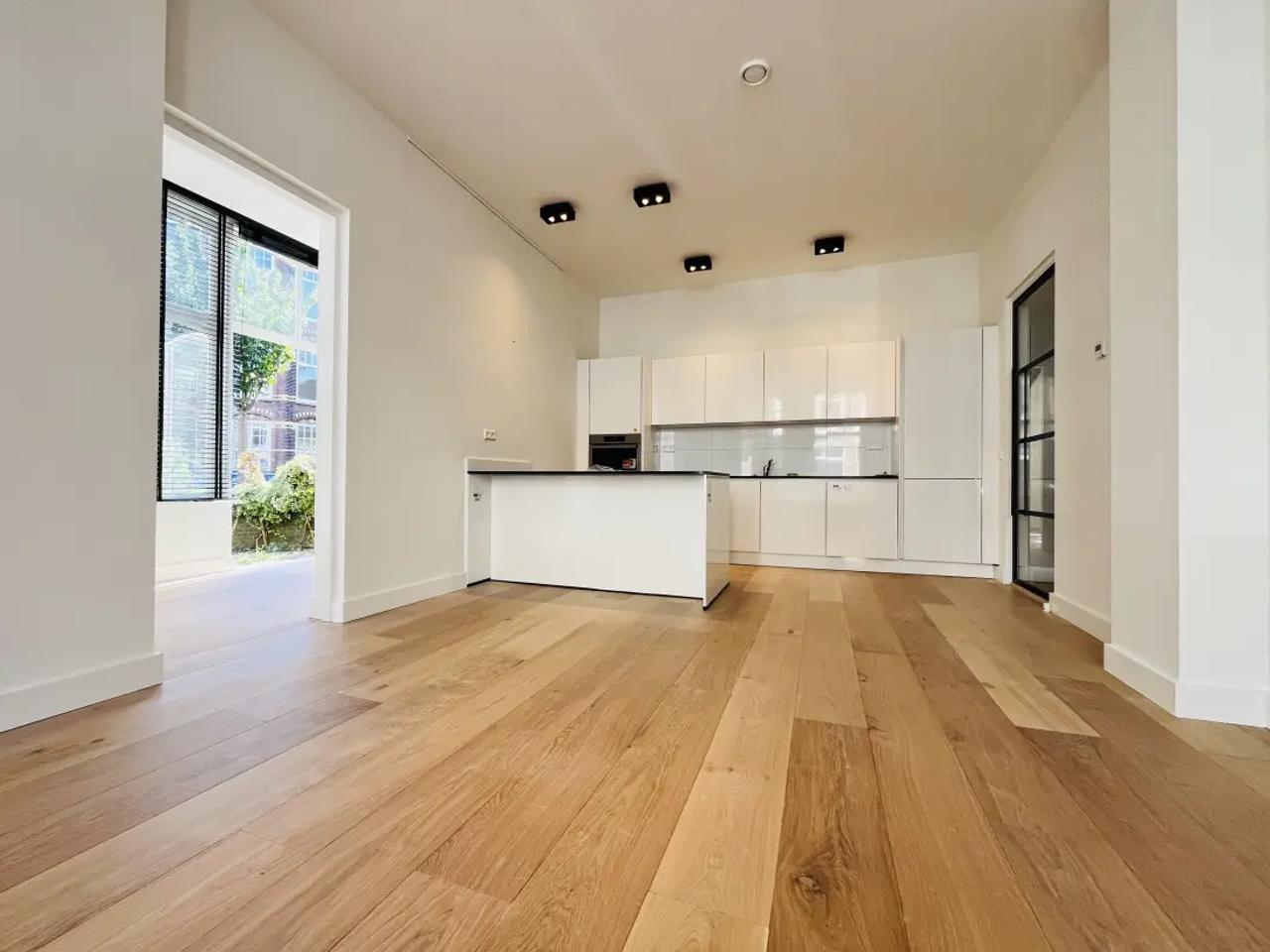 Begane grond appartement met tuin in Duinoord - Afbeelding 1