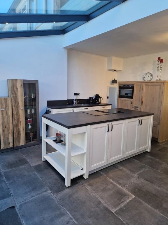 Gezinswoning met 4 slaapkamers en tuin - Afbeelding 7