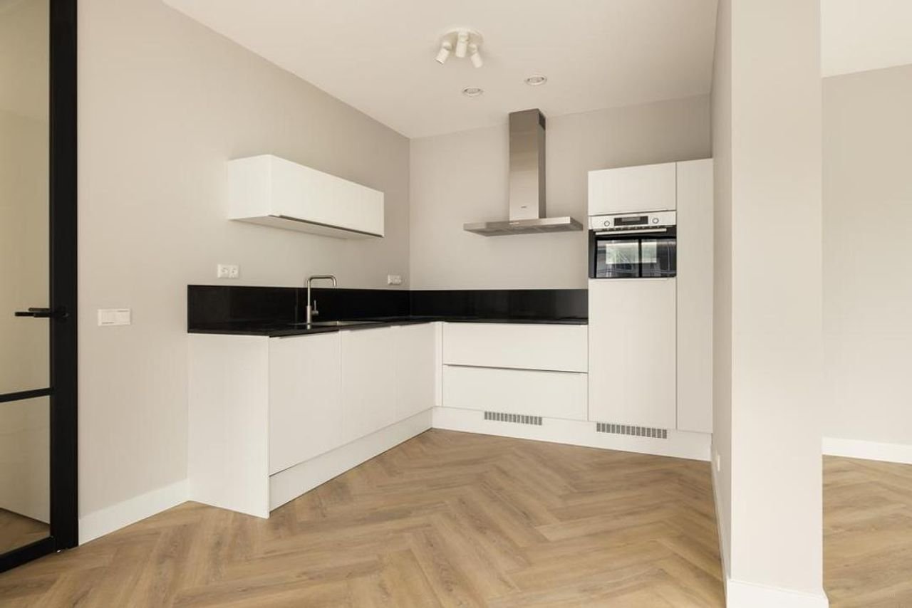 2-slaapkamerappartement met zonnig terras - Afbeelding 17
