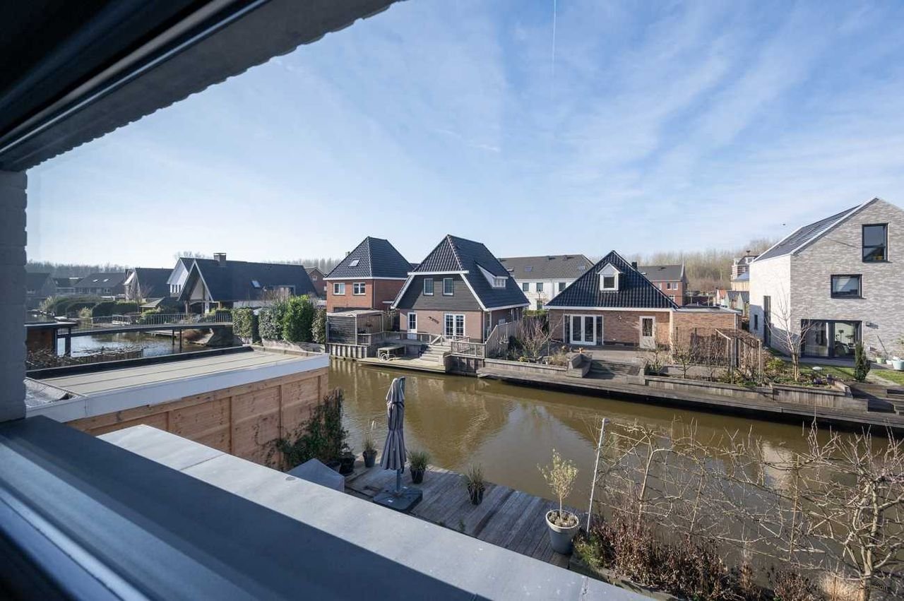Vrijstaande villa aan het water in Nobelhorst - Afbeelding 21