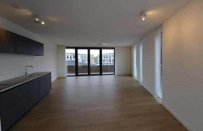 Licht 2-slaapkamerappartement met parkeerplek - Afbeelding 4