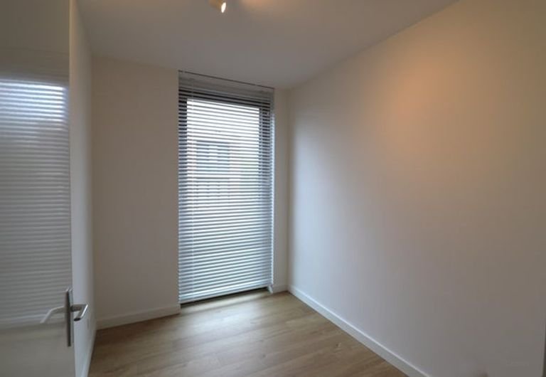Licht 2-slaapkamerappartement met parkeerplek - Afbeelding 12