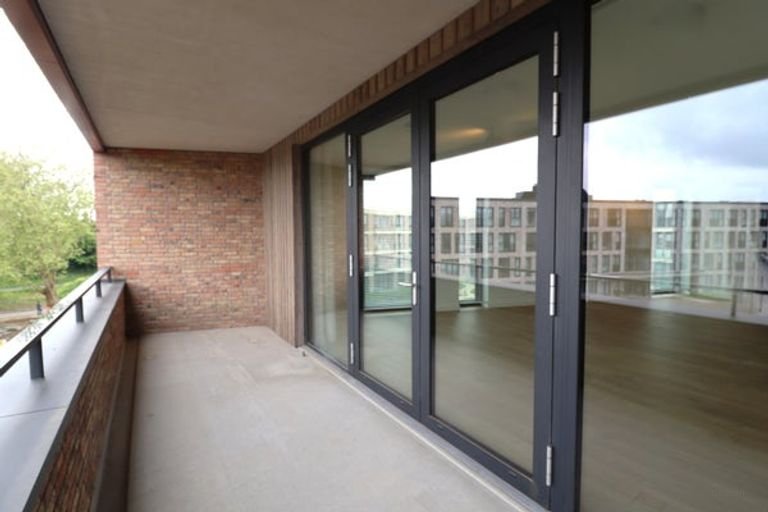 Licht 2-slaapkamerappartement met parkeerplek - Afbeelding 6