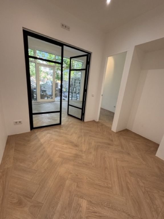 Gemeubileerd 70 m² appartement met tuin in Den Haag - Afbeelding 18