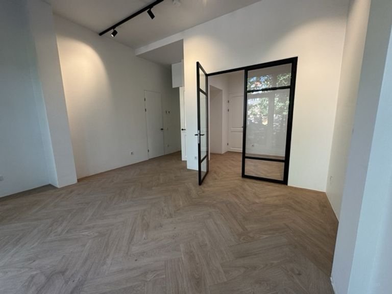 Gemeubileerd 70 m² appartement met tuin in Den Haag - Afbeelding 1