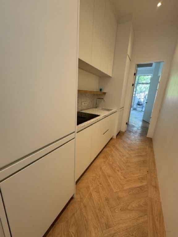 Gemeubileerd 70 m² appartement met tuin in Den Haag - Afbeelding 12