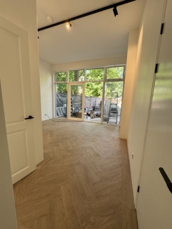 Gemeubileerd 70 m² appartement met tuin in Den Haag - Afbeelding 14