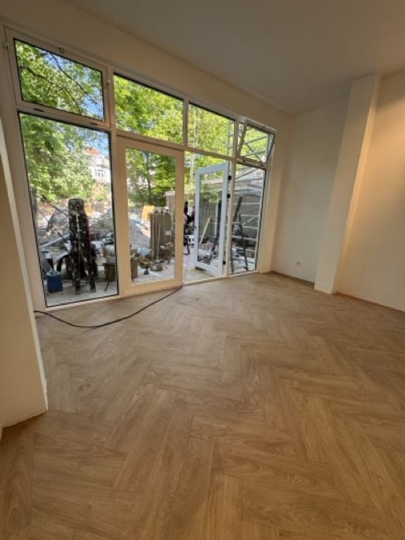 Gemeubileerd 70 m² appartement met tuin in Den Haag - Afbeelding 16