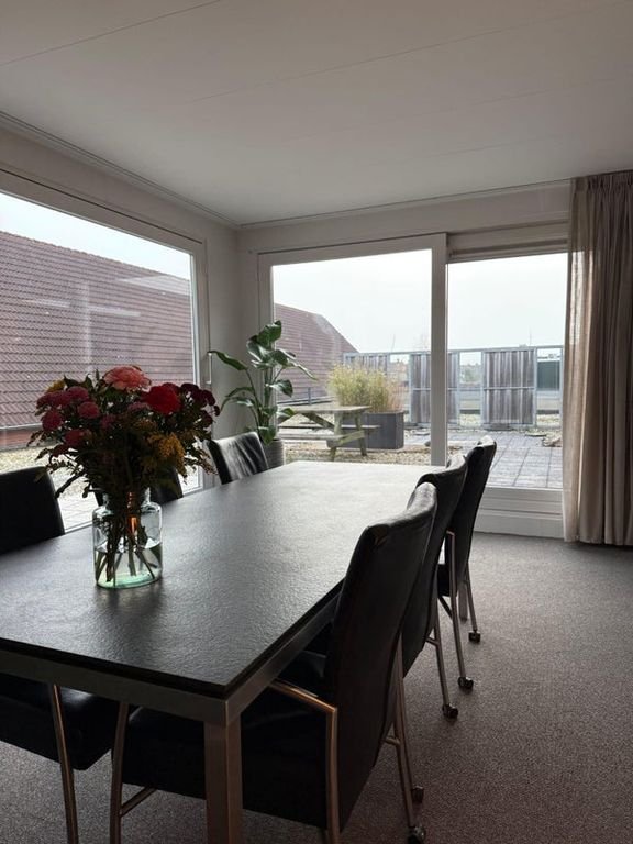 Upper-floor apartment of 155 m² with roof terrace in Enschede - Image 11