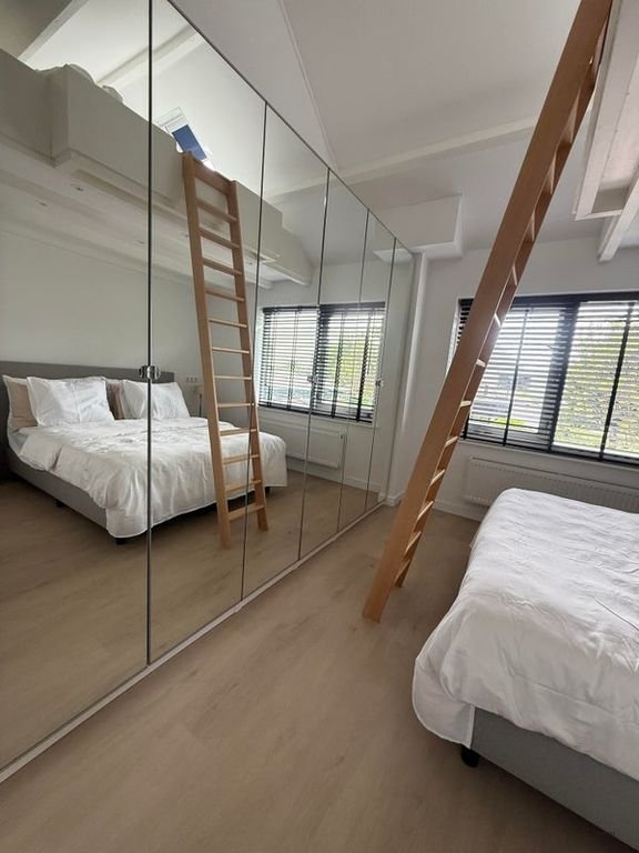 Huis met vlonderterras aan het water - Afbeelding 15