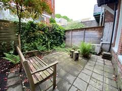 Begane grond appartement met tuin in Oost - Afbeelding 11