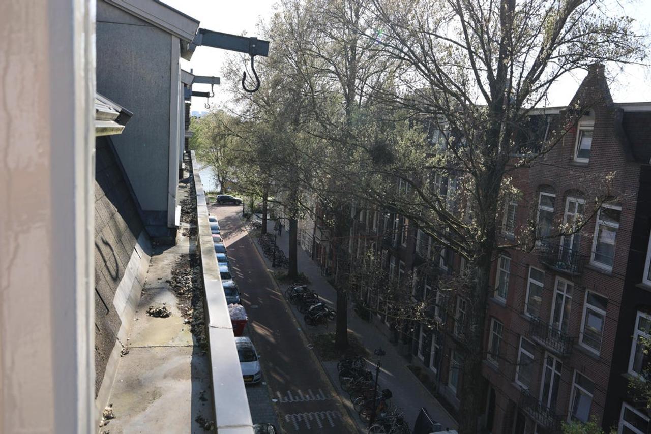 Lichte studio met terras bij Amstel - Afbeelding 16