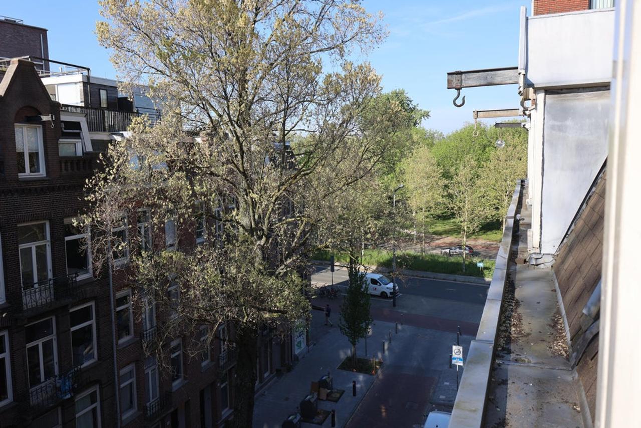 Lichte studio met terras bij Amstel - Afbeelding 8