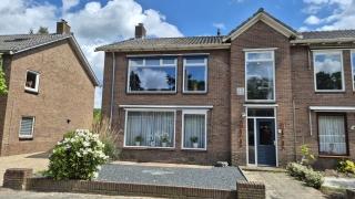 Benedenwoning met tuin en garage - Afbeelding 2
