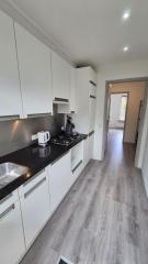 Benedenwoning met tuin en garage - Afbeelding 10