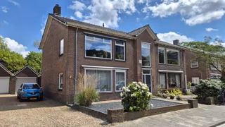 Benedenwoning met tuin en garage