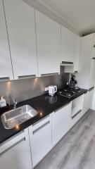 Benedenwoning met tuin en garage - Afbeelding 11