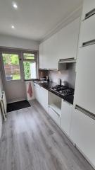 Benedenwoning met tuin en garage - Afbeelding 9