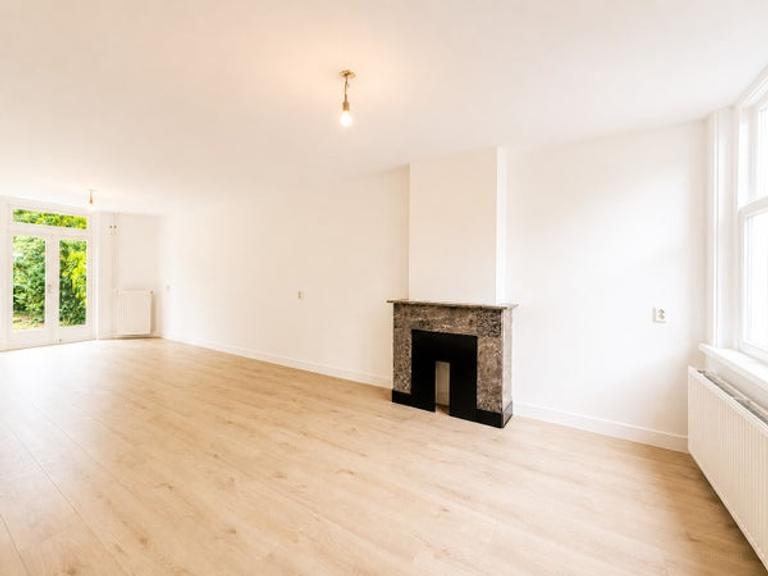 Appartement met diepe tuin in Oost - Afbeelding 1