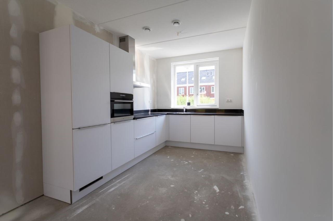 Gasloos wonen met tuin in Weideveld - Afbeelding 11