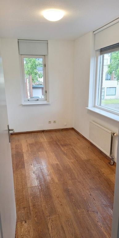 Tweekapper met garage en tuin in Reeshof - Afbeelding 22