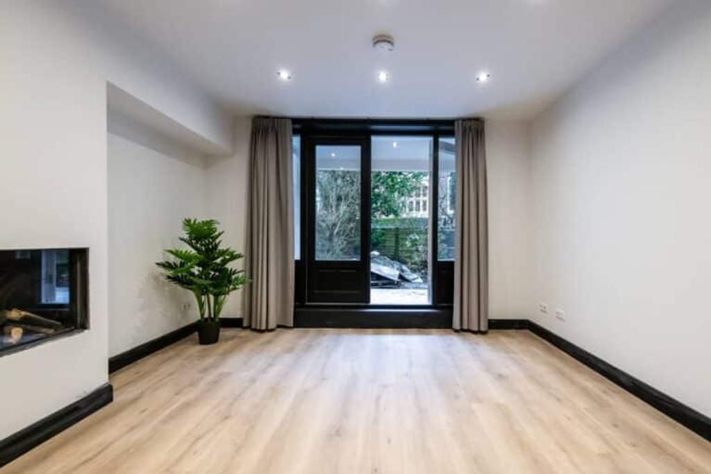 Monumentaal appartement met tuin - Afbeelding 3