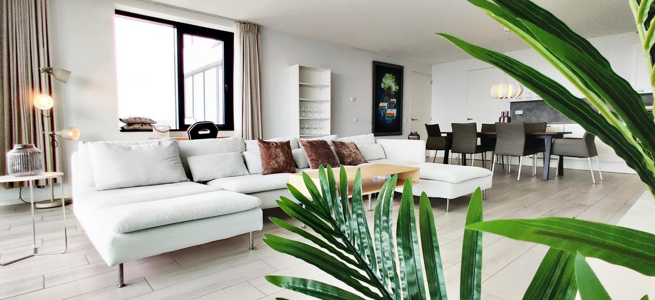 Wonen op 38 hoog naast Den Haag CS - Afbeelding 1