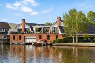 Penthouse met dakterrassen aan de Wetering