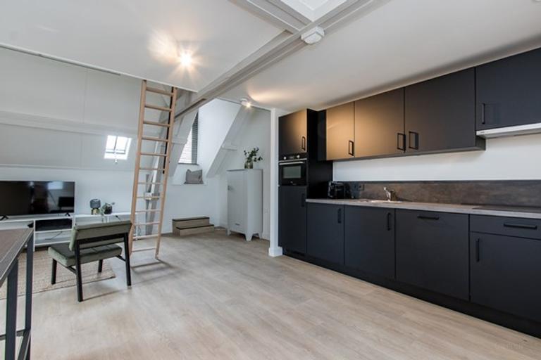 Gemeubileerd 2-kamerappartement in de binnenstad - Afbeelding 2