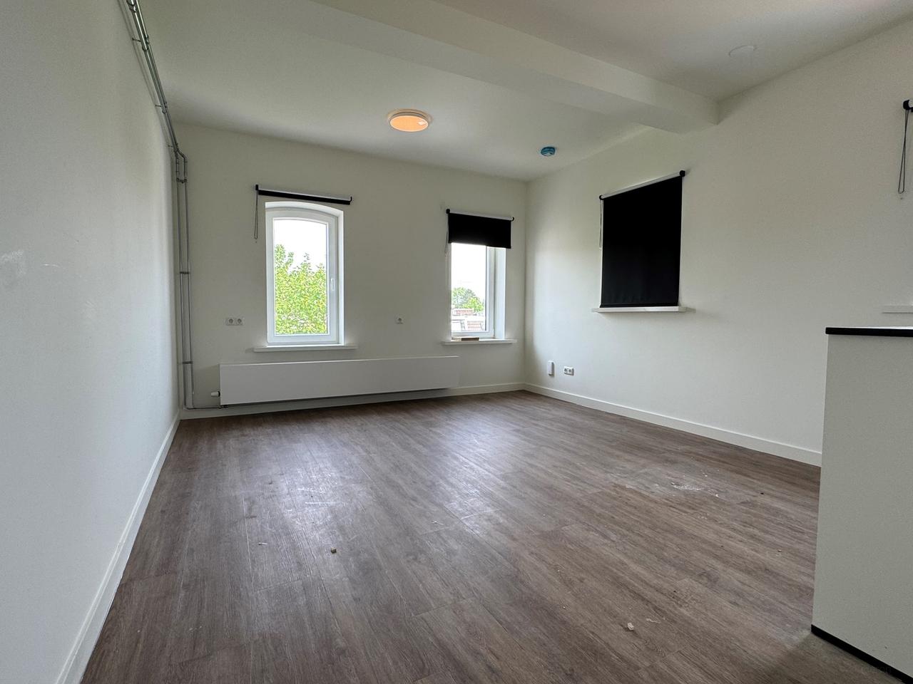 Bright room with kitchen in Helpman - Image 6