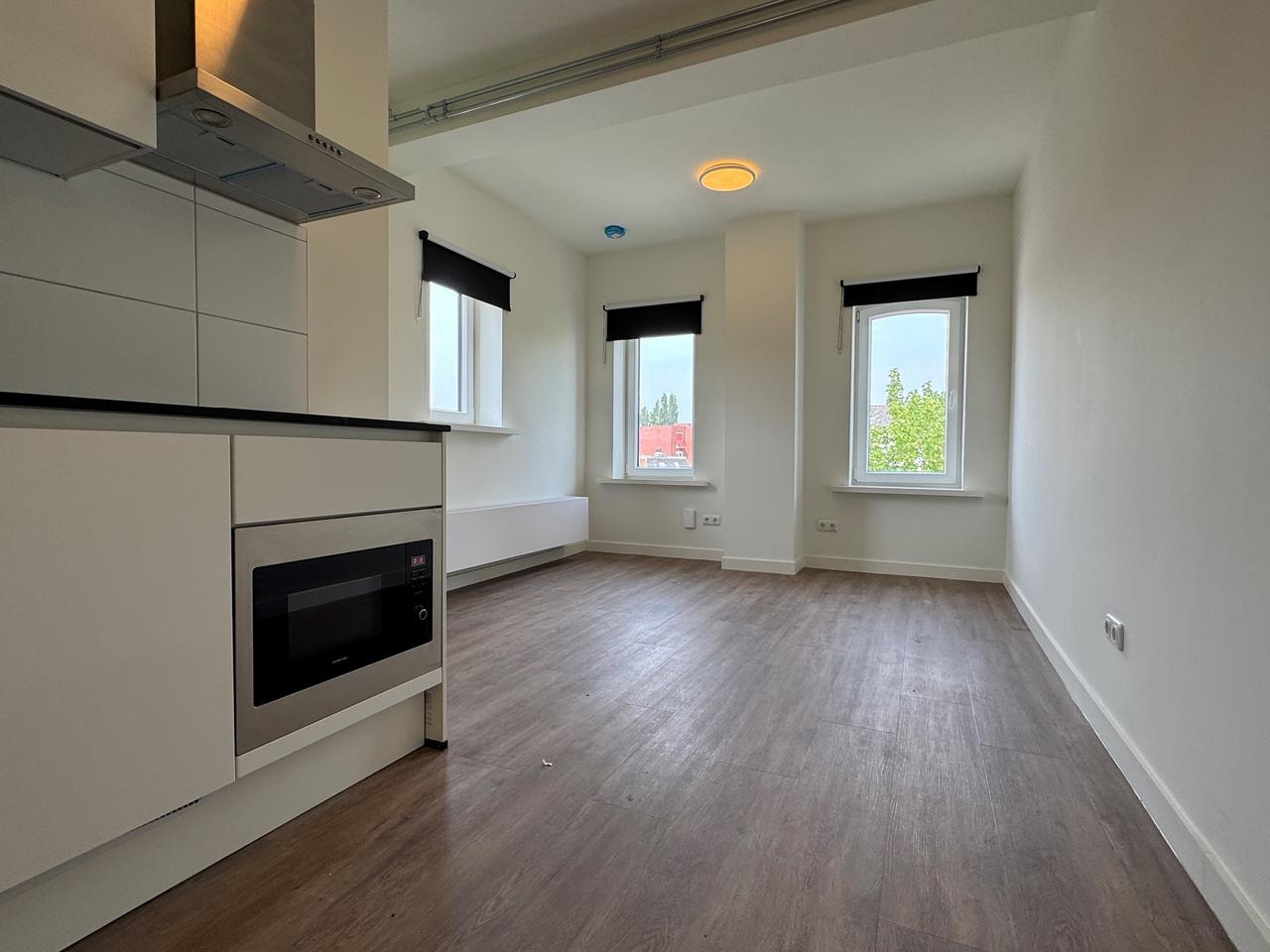 Bright room with kitchen in Helpman - Image 4