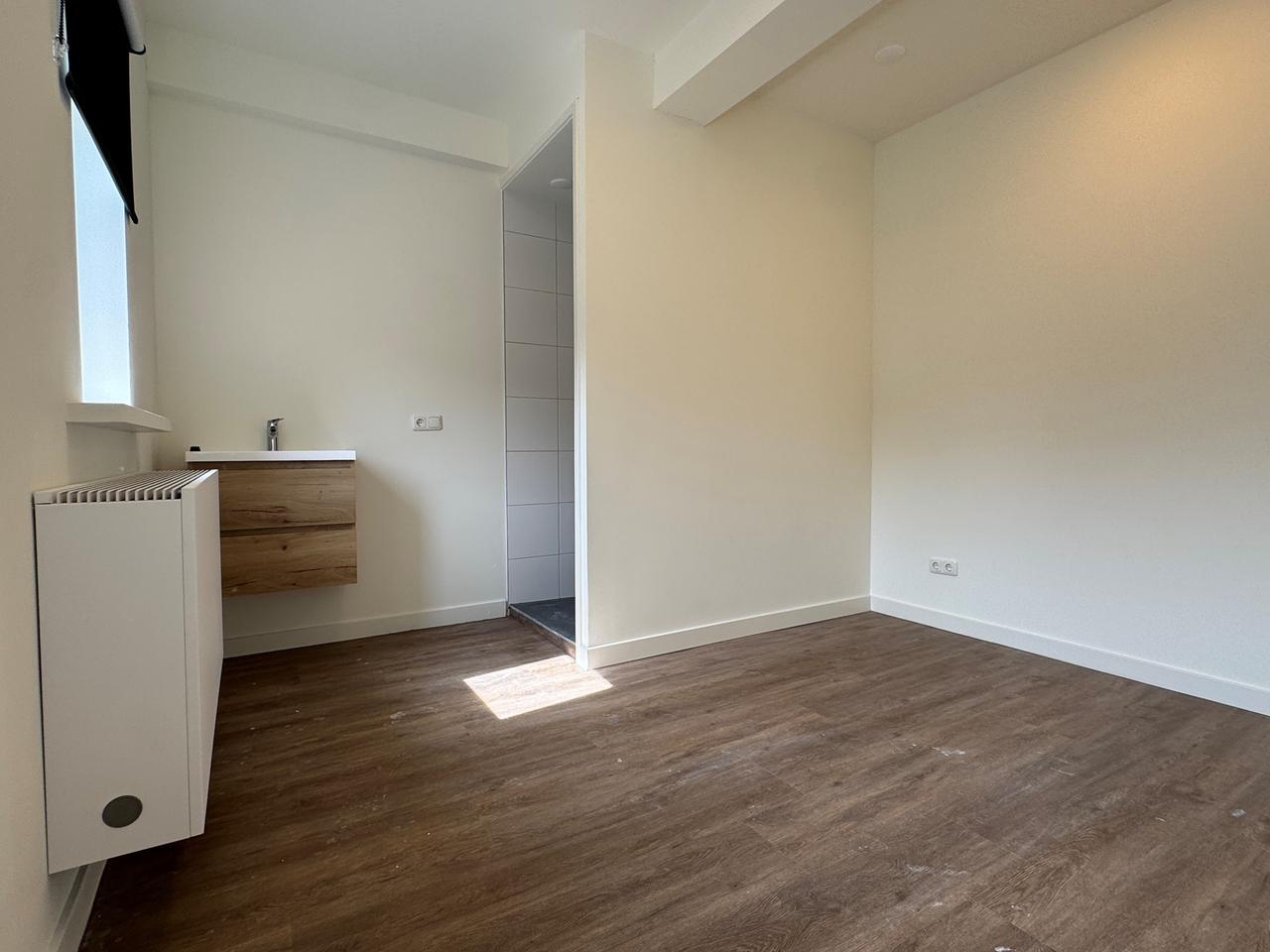Bright room with kitchen in Helpman - Image 12
