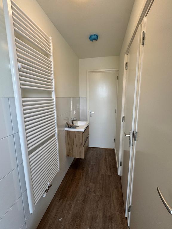 Bright room with kitchen in Helpman - Image 15